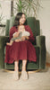Child with mother seated in a Crewe recliner for mobile