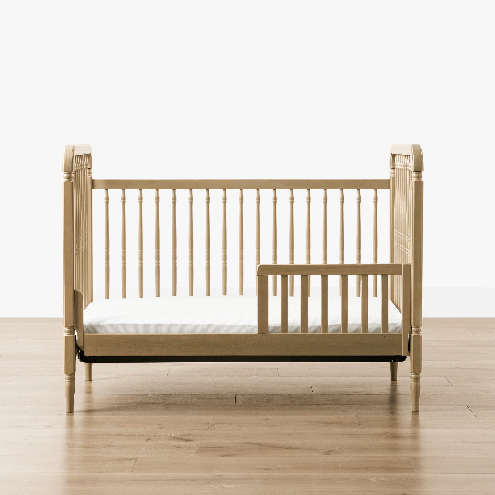 M7101WP,Namesake,Liberty 3-in-1 Convertible Spindle Crib w/Toddler Bed Conversion Kit in Washed Pine