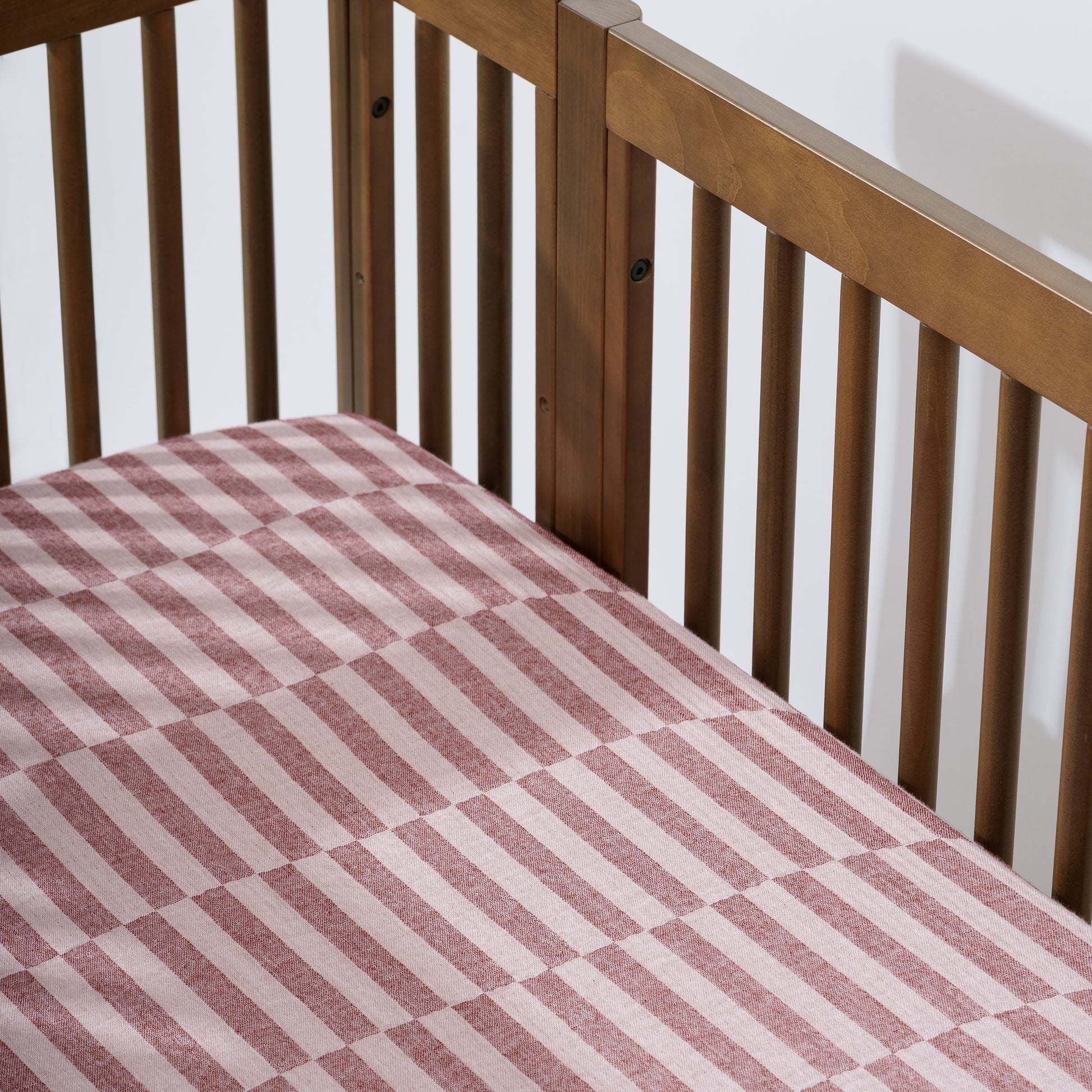 T30435,Babyletto,Maroon Stripe Muslin Crib Sheet in GOTS Certified Organic Cotton