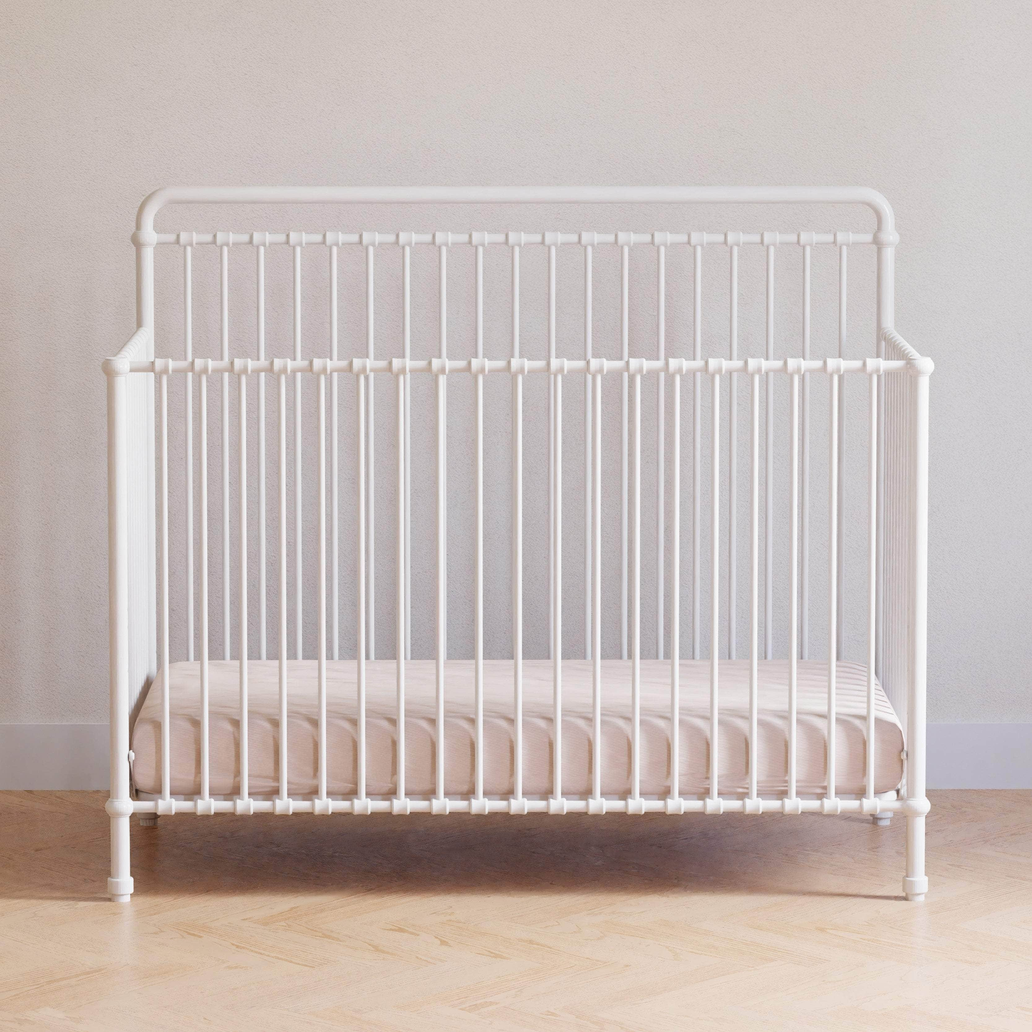 White metal store convertible crib