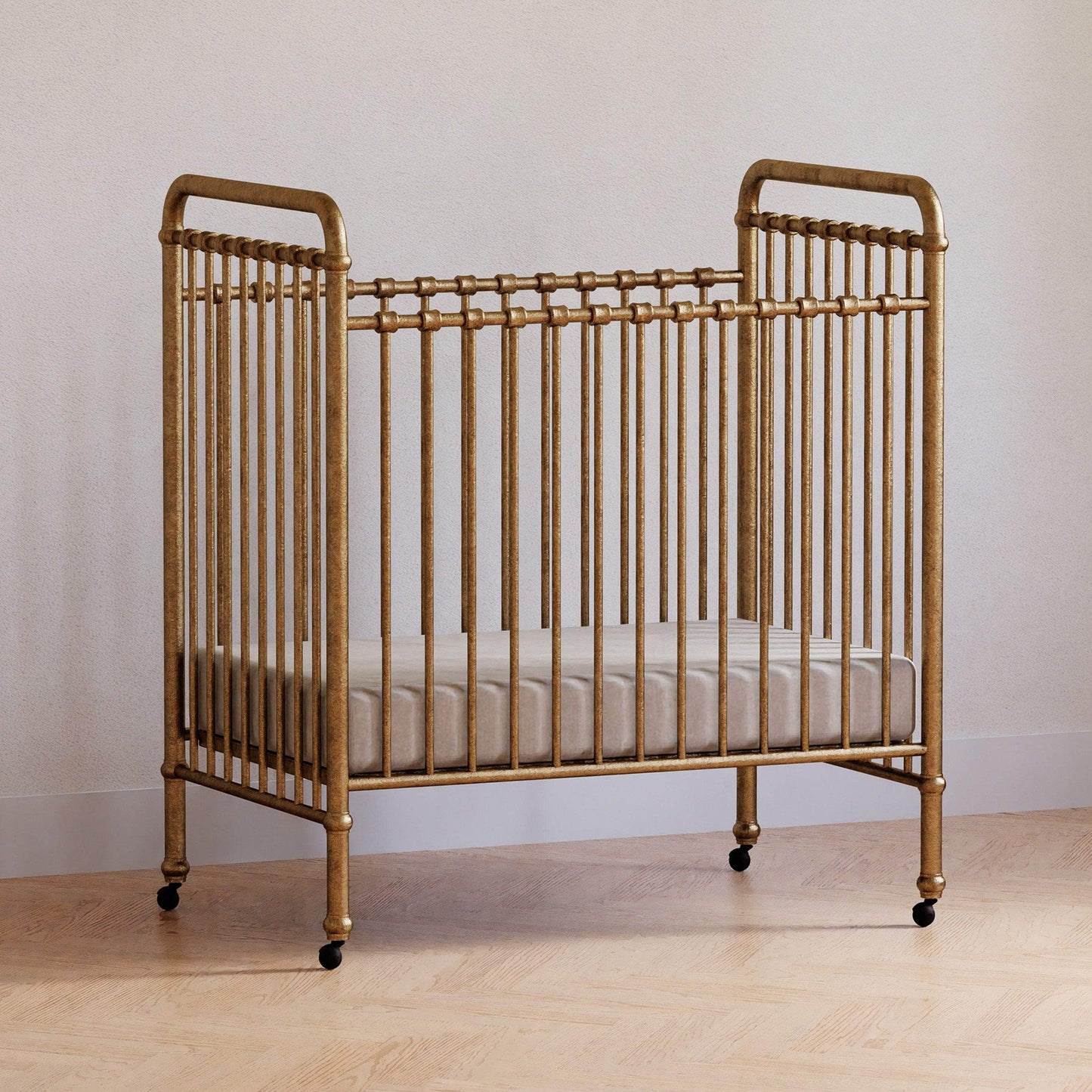 M15598VG,Abigail 3-in-1 Convertible Mini Crib in Vintage Gold